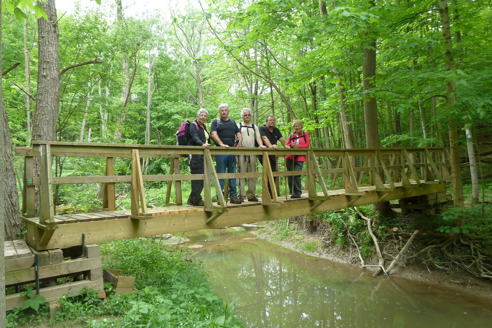 Group posing on great bridge Thames Valley Trail Club built for everyone's enjoyment.